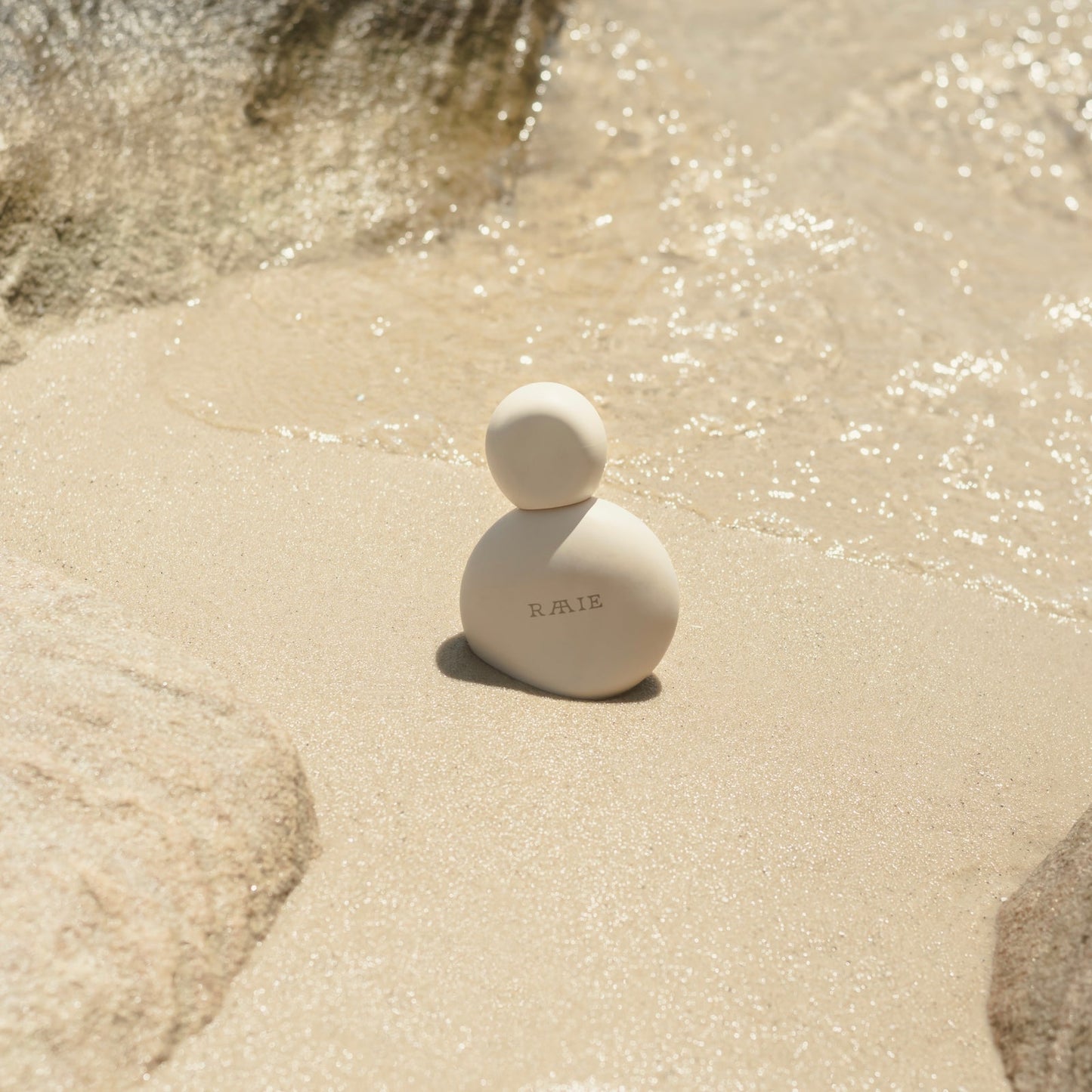 RAAIE | Sun Milk Drops - Tinted SPF50+ Auto renew