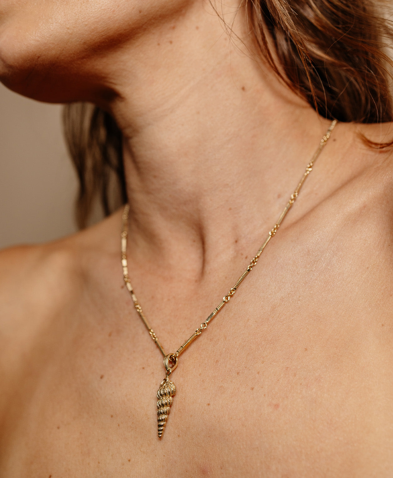 Zoe & Morgan | Shell Seeker Charm - Gold